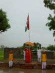 Swamiji hoisting Indian national flag